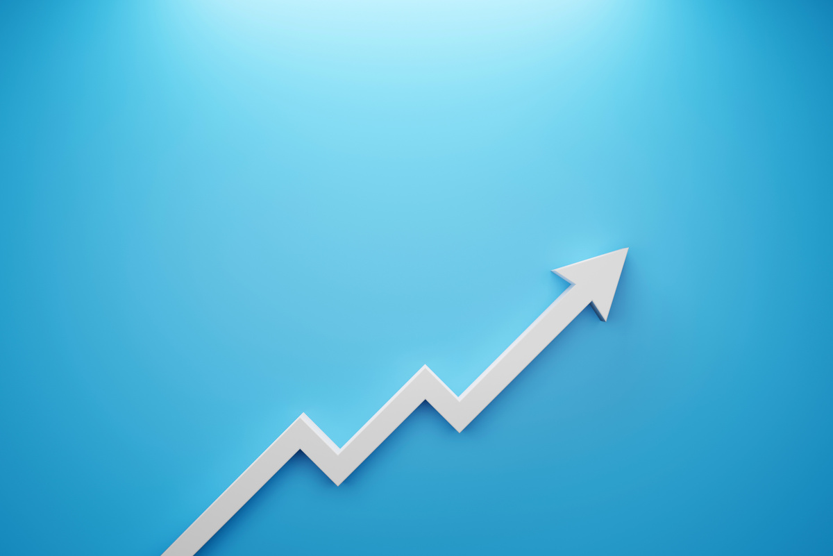 Arrow Sign Growth on Blue Background. Business Development to Su